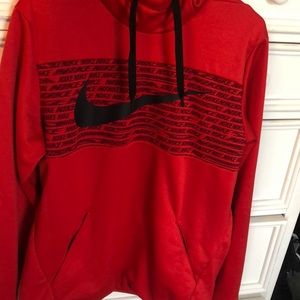 Nike red sweatshirt with high neck.